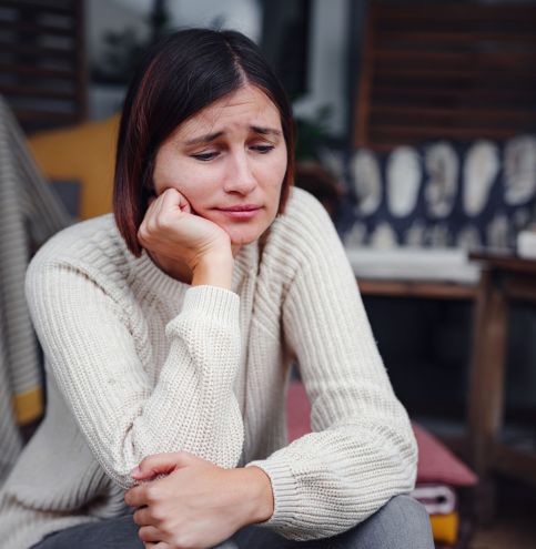 Young depressed asian woman sitting on porch of backyard. Young depressed asian woman sitting on porch of backyard. She feeling sad and worried suffering depression in mental health. Mental health, anxiety depressed thinking chinese lady.